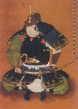 Sakakibara Yasumasa sitting in agura